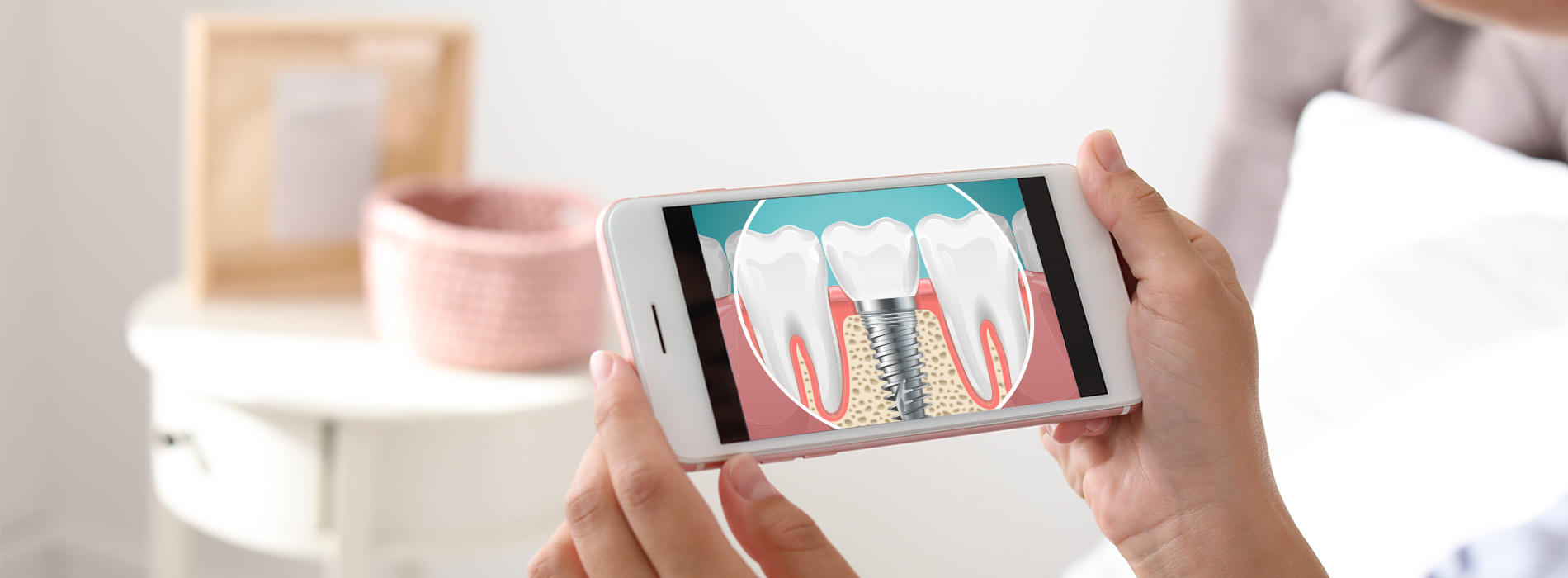 The image shows a person holding a smartphone displaying an app with a toothbrush graphic and dental care products, suggesting oral hygiene or dental health education.